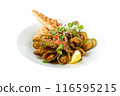 Mussels with Sauce and Bread is a classic dish that epitomizes coastal dining.  116595215