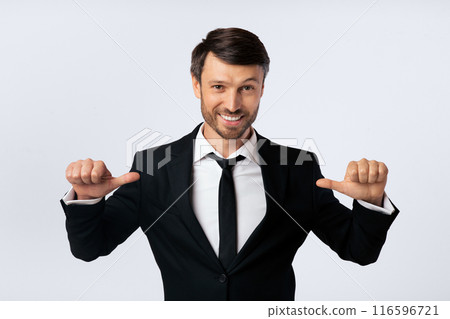 Confidence. Businessman Pointing Thumbs At Himself Over White Background In Studio. Isolated 116596721