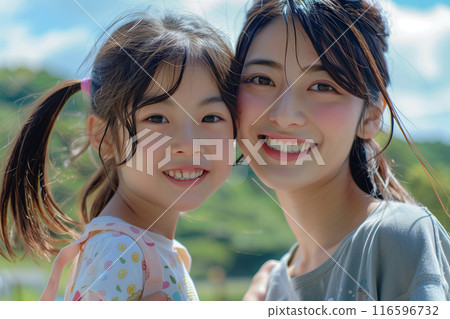 Smiley mom and daughter Smiley mom and daughter 116596732