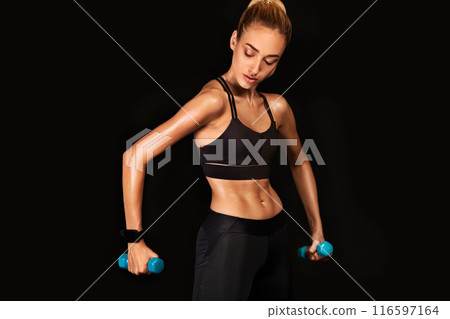 Sport Motivation. Young Lady Exercising With Dumbbells Standing In Studio Over Black Background. 116597164