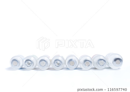 Group of vaccinations bottles leaning down on white background. medical concept Group of vaccinations bottles leaning down on white background. medical concept 116597740