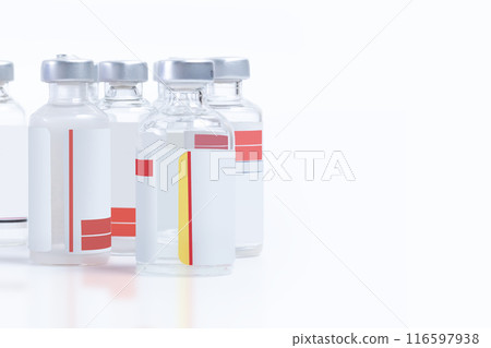 Medical vaccine vials on white background with copy space. Medical vaccine vials on white background with copy space. 116597938