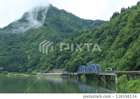 Tadami Line "Tadami River No. 8 Bridge and Single Train" with Mount Gamou in the background Tadami Line "Tadami River No. 8 Bridge and Single Train" with Mount Gamou in the background 116598114