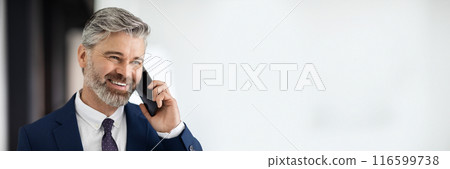 Closeup Portrait Of Handsome Mature Businessman Talking On Mobile Phone Indoors, Smiling Middle Aged Man Wearing Suit Enjoying Cellphone Conversation, Entrepreneur Having Pleasant Call, Copy Space Closeup Portrait Of Handsome Mature Businessman Talking On Mobile Phone Indoors, Smiling Middle Aged Man Wearing Suit Enjoying Cellphone Conversation, Entrepreneur Having Pleasant Call, Copy Space 116599738