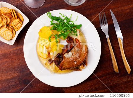 Confit duck with boiled potato and arugula Confit duck with boiled potato and arugula 116600595