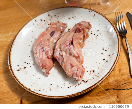 Smoked pork leg served on platter 116600679