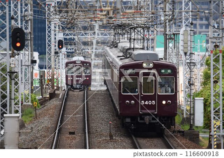 Hankyu Railway Kyoto Line Maroon train crossing the Yodo River Hankyu Railway Kyoto Line Maroon train crossing the Yodo River 116600918