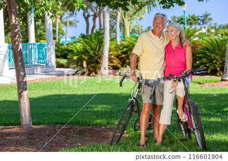 Happy Senior Couple Healthy Retired Lifestyle on Bicycles In a Park Happy Senior Couple Healthy Retired Lifestyle on Bicycles In a Park 116601904