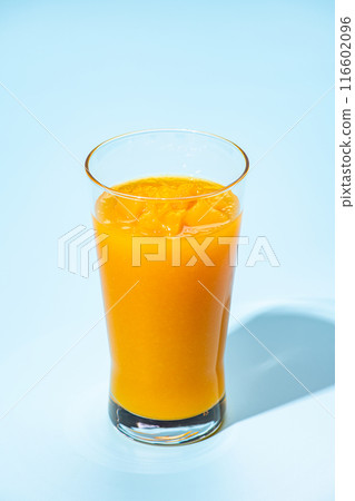 Mango frappe on light blue background Mango frappe on light blue background 116602096