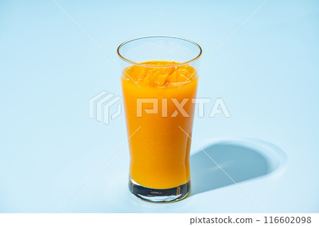 Mango frappe on light blue background Mango frappe on light blue background 116602098