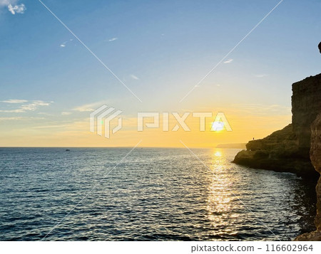 Scenic view of sea during sunset, Portugal, Algarve. Scenic view of sea during sunset, Portugal, Algarve. 116602964