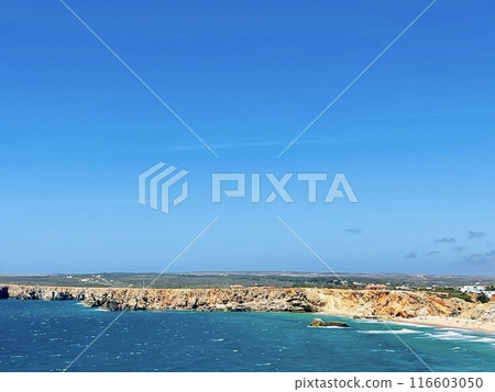 View of strong waves hitting the rock at Sagres, Algarve, Portugal. 116603050