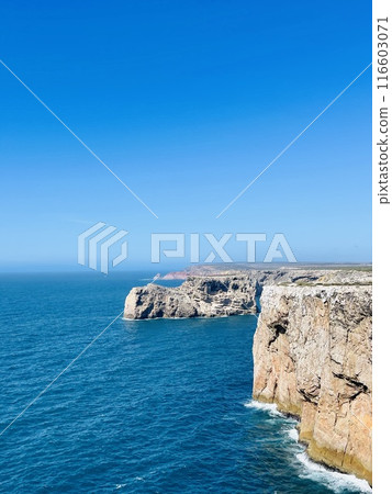 View of strong waves hitting the rock at Sagres, Algarve, Portugal. View of strong waves hitting the rock at Sagres, Algarve, Portugal. 116603071
