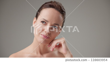 Concept of beauty, health, cosmetics, anti-aging therapy and skin care - young beautiful brunette Caucasian woman thoughtfully looks around making difficult choice thinking through actions Concept of beauty, health, cosmetics, anti-aging therapy and skin care - young beautiful brunette Caucasian woman thoughtfully looks around making difficult choice thinking through actions 116603954