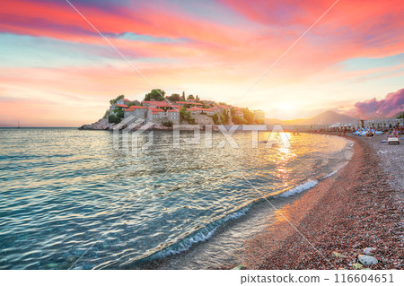 Captivating sunset view of luxury beach and islet Sveti Stefan near Budva. Captivating sunset view of luxury beach and islet Sveti Stefan near Budva. 116604651