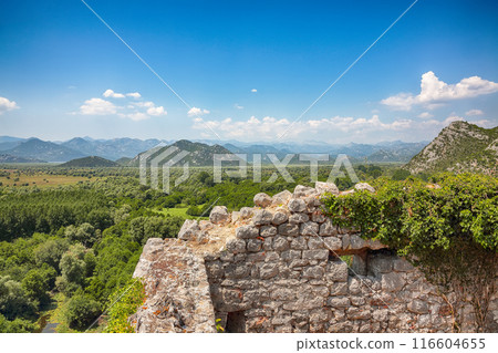 Captivating sunny morning view of valley of Moraca river from Zabljak Crnojevica Fortress. Captivating sunny morning view of valley of Moraca river from Zabljak Crnojevica Fortress. 116604655
