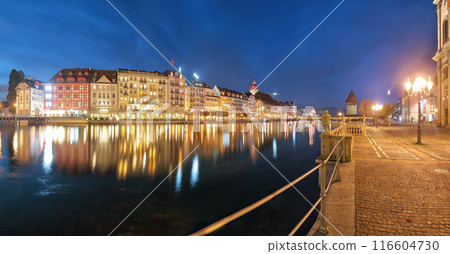 Beautiful historic city center of Lucerne with famous buildings and promanade during night.. 116604730