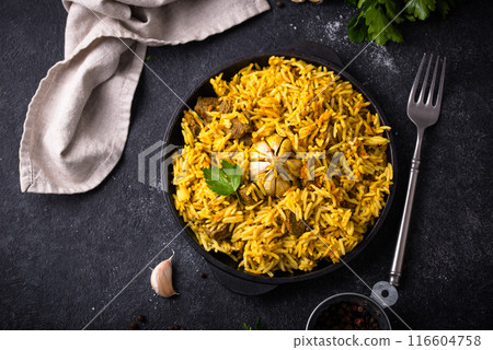 Pilaf, rice with vegetables and lamb meat 116604758