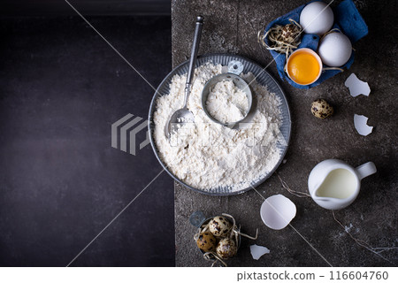 Baking ingredients with flour and eggs 116604760
