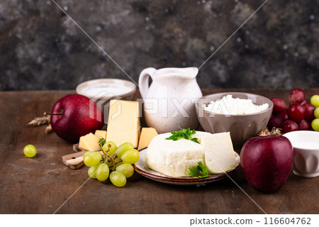Judaic holiday Shavuot concept. Tzfat cheese and dairy products Judaic holiday Shavuot concept. Tzfat cheese and dairy products 116604762