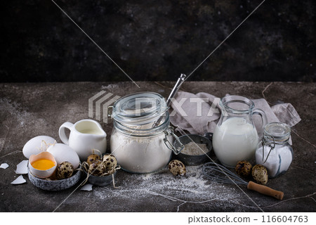 Baking ingredients with flour and eggs Baking ingredients with flour and eggs 116604763