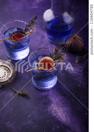 Purple fig cocktail or mocktail in glass Purple fig cocktail or mocktail in glass 116604780