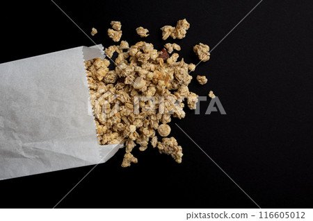 heap of granola muesli isolated on black background 116605012