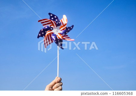 American Pinwheel in Blue Sky. American independence day American Pinwheel in Blue Sky. American independence day 116605368