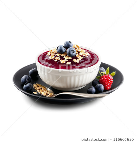 Oat cream in a glass ramekin topped with a swirl of berry coulis and a 116605650