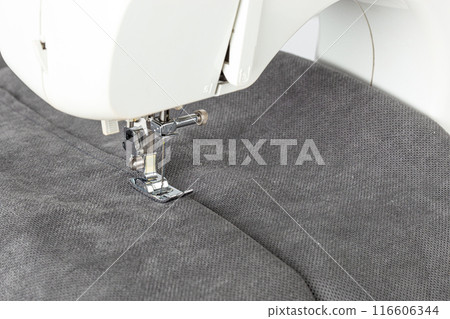 Sewing machine, stitching fabrics, needle in a round plan 116606344