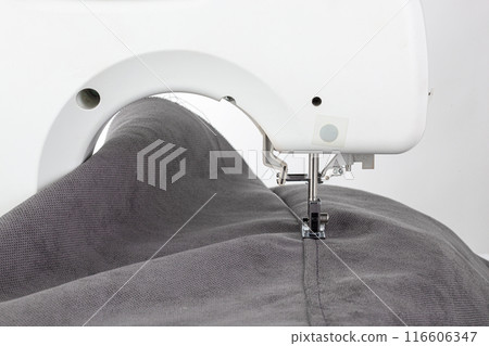 Sewing machine, stitching fabrics, needle in a round plan Sewing machine, stitching fabrics, needle in a round plan 116606347