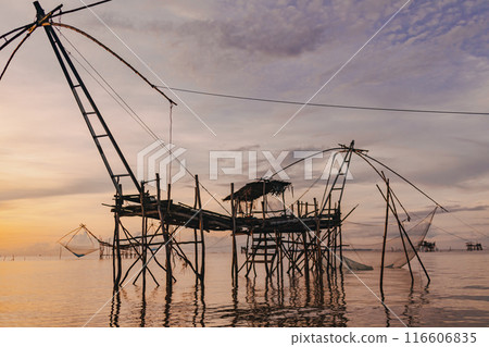 Villager large fish net lifting in Songkhla lake, Phatthalung, Thailand. Villager large fish net lifting in Songkhla lake, Phatthalung, Thailand. 116606835