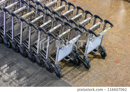Airport trolleys get ready to serve passengers at Airport. Airport trolleys get ready to serve passengers at Airport. 116607062