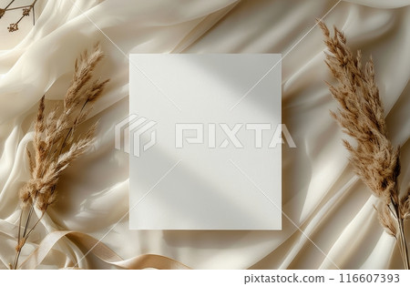 Blank White Card on Cream Fabric With Dried Pampas Grass 116607393