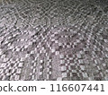Handmade homespun fabric in an old rustic ethnic style. Traditional warm handmade texture effect. 116607441