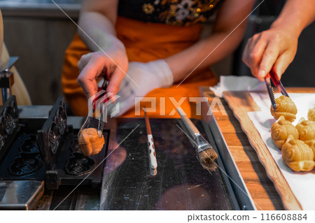 Shapes made of pastry dough on baking paper Shapes made of pastry dough on baking paper 116608884