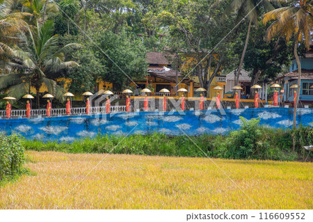 row of Buddhist monk statues in Dambulla 116609552