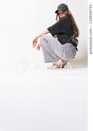 grey posing female dark-haired cap tank top streetstyle scuffs fitted cap casual looking trucker hat style grey posing female dark-haired cap tank top streetstyle scuffs fitted cap casual looking trucker hat style 116609793