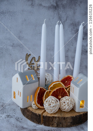 DIY process of making Christmas arrangement of advent candle calendar four weeks. Series of handmade craft instruction. Zero waste eco-friendly winter holiday decoration. New year DIY process of making Christmas arrangement of advent candle calendar four weeks. Series of handmade craft instruction. Zero waste eco-friendly winter holiday decoration. New year 116610226
