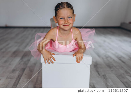 Baby ballet studio. Little ballerina with a coach in dance class. Ballet trainer for children 116611207