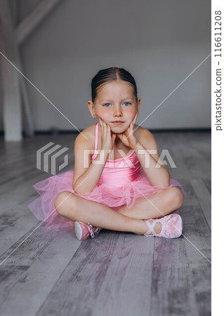 Baby ballet studio. Little ballerina with a coach in dance class. Ballet trainer for children 116611208
