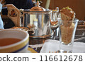 Elegant time at afternoon tea 116612678