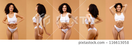 A young black woman with dark curly hair poses in white underwear against a pale beige background. She smiles and looks directly at the camera in several different poses. 116613058