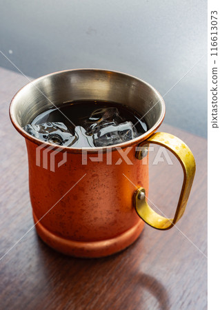 Well-chilled iced coffee in a metal cup 116613073
