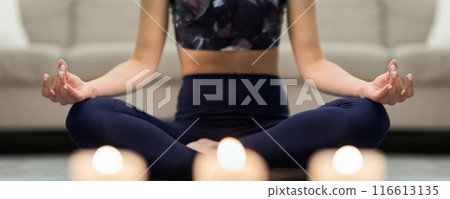 Aroma Meditation. Girl In Lotus Position Sitting On Floor With Candles 116613135
