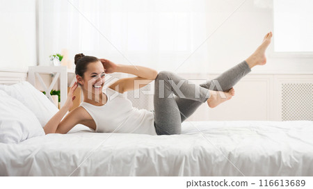 Morning Workout. Woman Doing Abs Exercise On Bed After Wake Up, Panorama 116613689