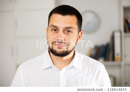 Portrait of positive man office worker 116614655