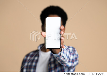 Mockup for app. Guy demonstrating blank screen of smartphone, copy space, closeup Mockup for app. Guy demonstrating blank screen of smartphone, copy space, closeup 116615598