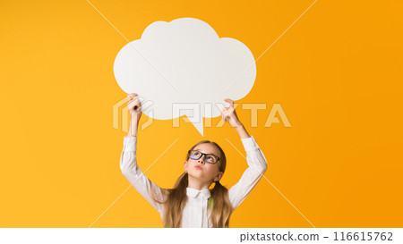 Thinking Of School. Pensive Little Schoolgirl Holding Speech Bubble Overhead On Yellow Background. Mockup, Copy Space 116615762