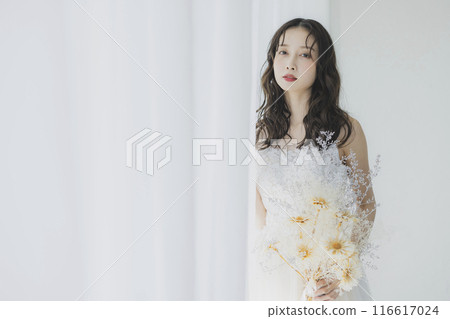 Woman in wedding dress Woman in wedding dress 116617024